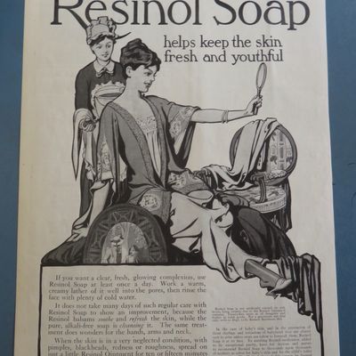 1915 Resinol Soap with Woman Looking In A Mirror