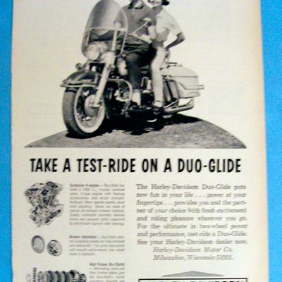 1964 Harley-Davidson Duo Glide Motorcycle with Couple