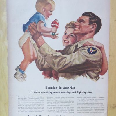 1943 North American Aviation with Soldier Holding Baby