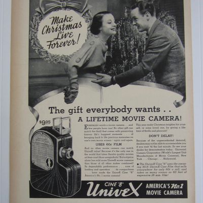 1937 Cine 8 Univex Movie Camera with Man & Woman