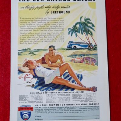 1939 Greyhound Lines with Couple Laying on the Beach
