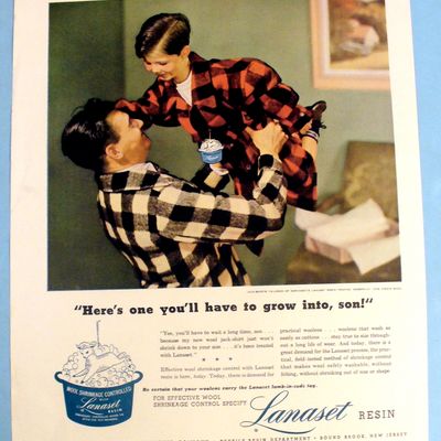 1947 Lanaset Resin with Man Picking up a Boy