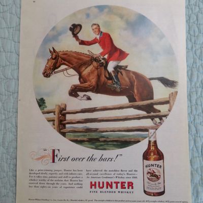 1947 Hunter Whiskey with Man Riding on a Horse