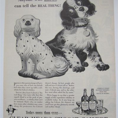 1944 Calvert Whiskey with Dog Looking at Dog Statue