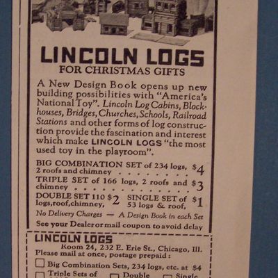 1926 Lincoln Logs with Two Children Playing with Logs