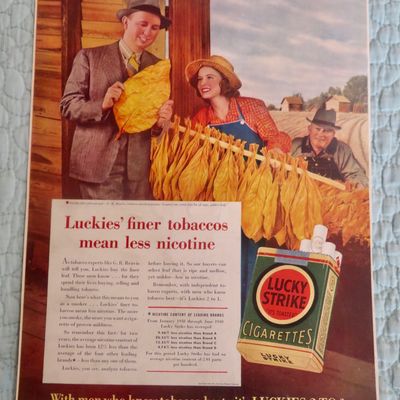 1940 Lucky Strike Cigarette with Man Looking At Tobacco
