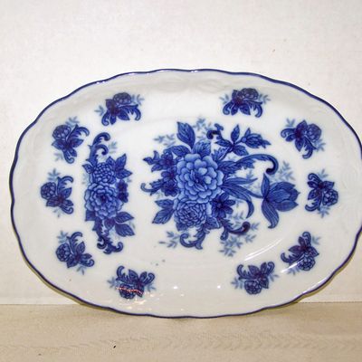 Blue Flowers on White Under Plate