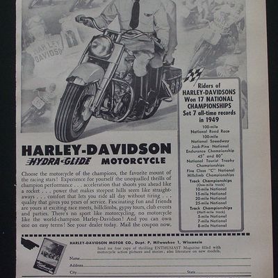 1950 Harley Davidson Hydra-Glide Motorcycle with a Man