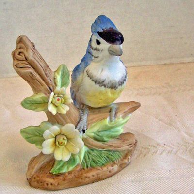 Bisque Bird Sitting on Branch with Flowers Figurine