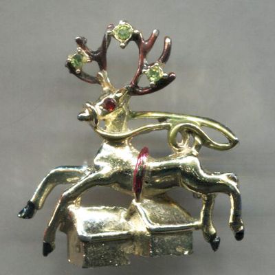 Reindeer Flying Over Houses Pin