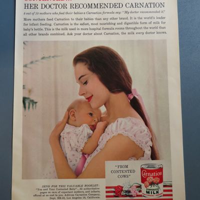 1959 Carnation Milk with Woman Holding Baby