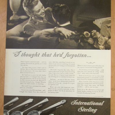 1946 International Sterling with Man & Woman on a Couch