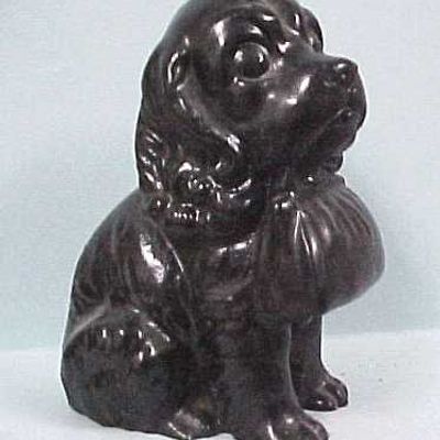 Coal Resin Puppy Holding Purse