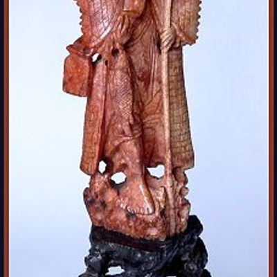 Carved soapstone figure: "God of ..."