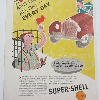 1937 Super Shell Gas w Man In Manhole while Waving Flag