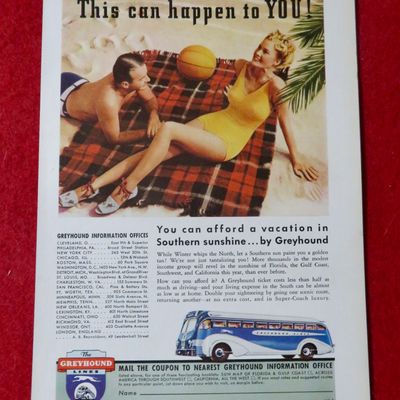 1939 Greyhound Lines with Couple Laying on the Beach