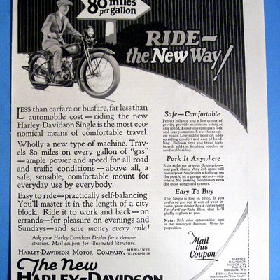 1926 Harley Davidson Single Motorcycle with Man Riding