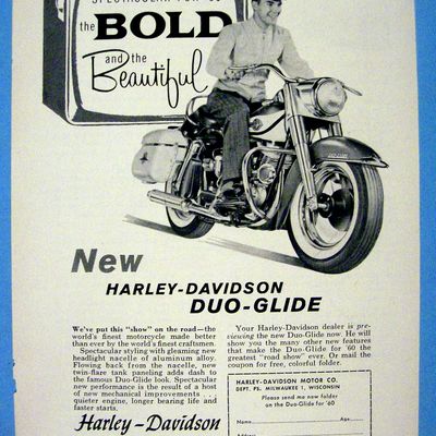 1960 Harley Davidson Duo Glide with Man on Bike
