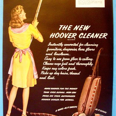 1945 New Hoover Cleaner with Woman  Vacuuming