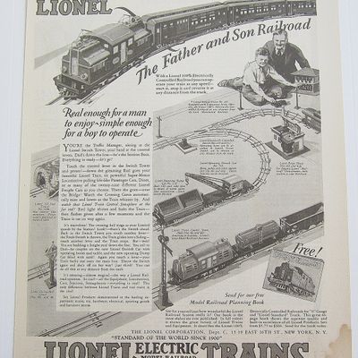 1927 Lionel Trains With Father & Son Playing with Train