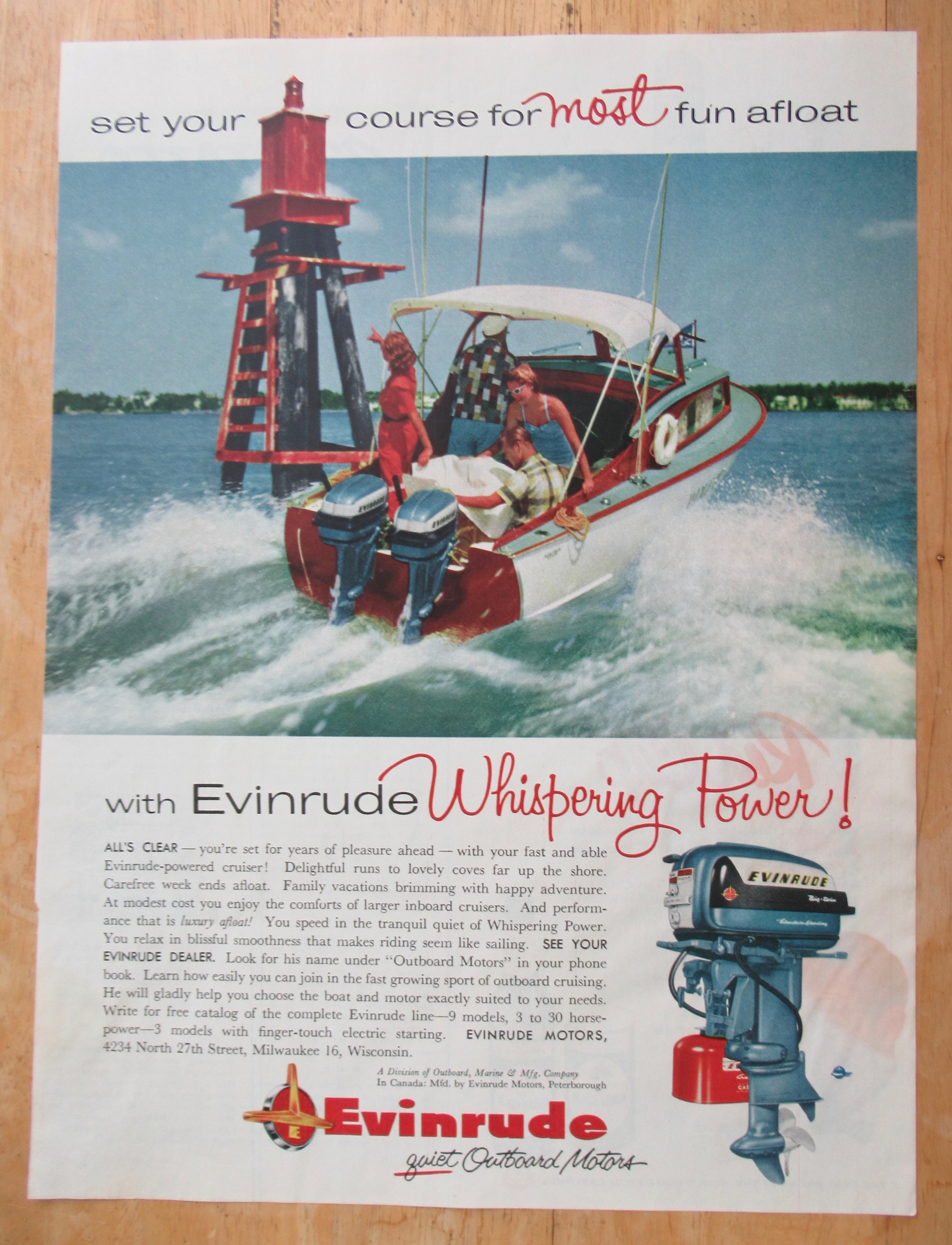 1956 Evinrude Outboard Motors with Two Couples