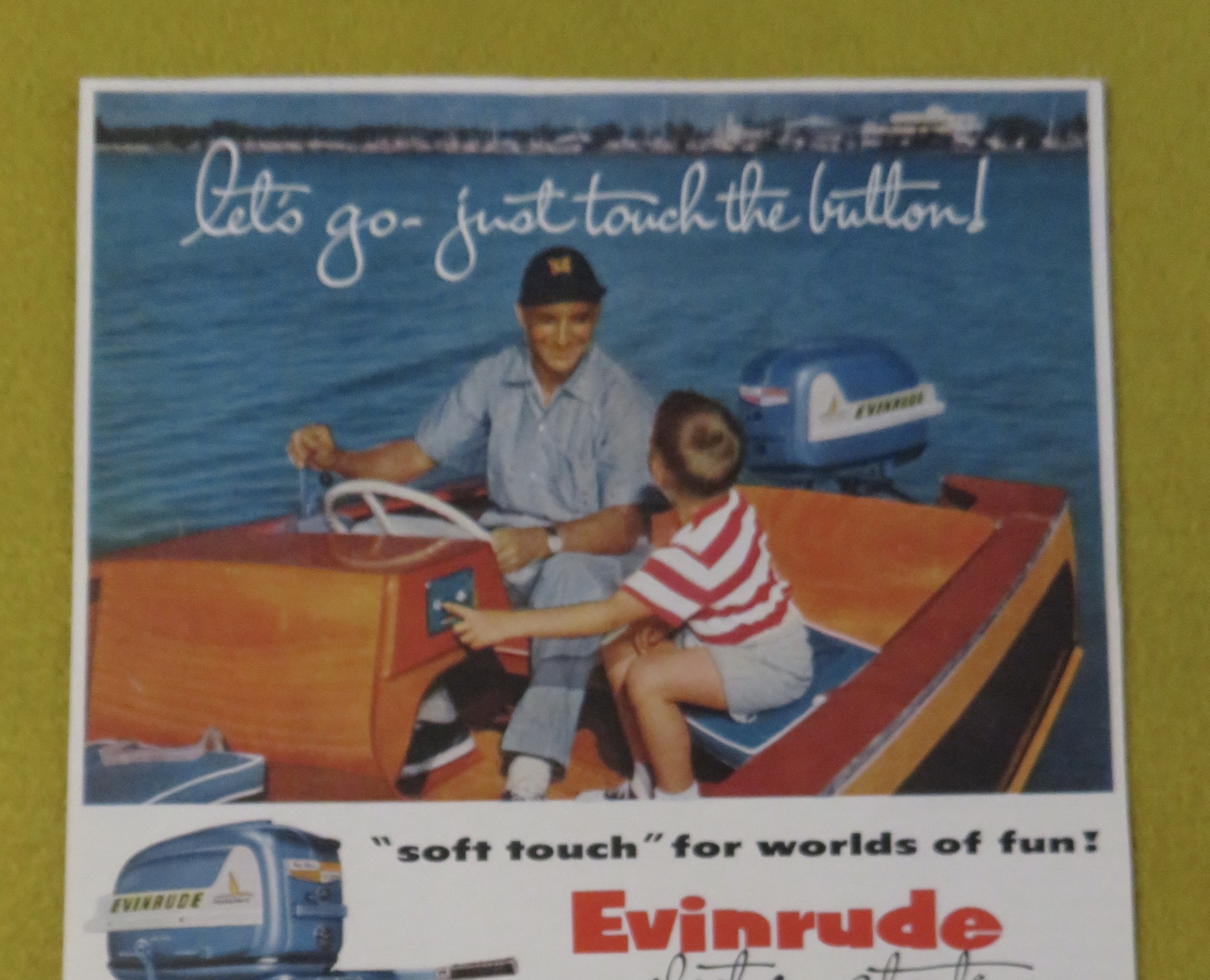 1950 Evinrude Outboard Motors with Father & Son On Boat