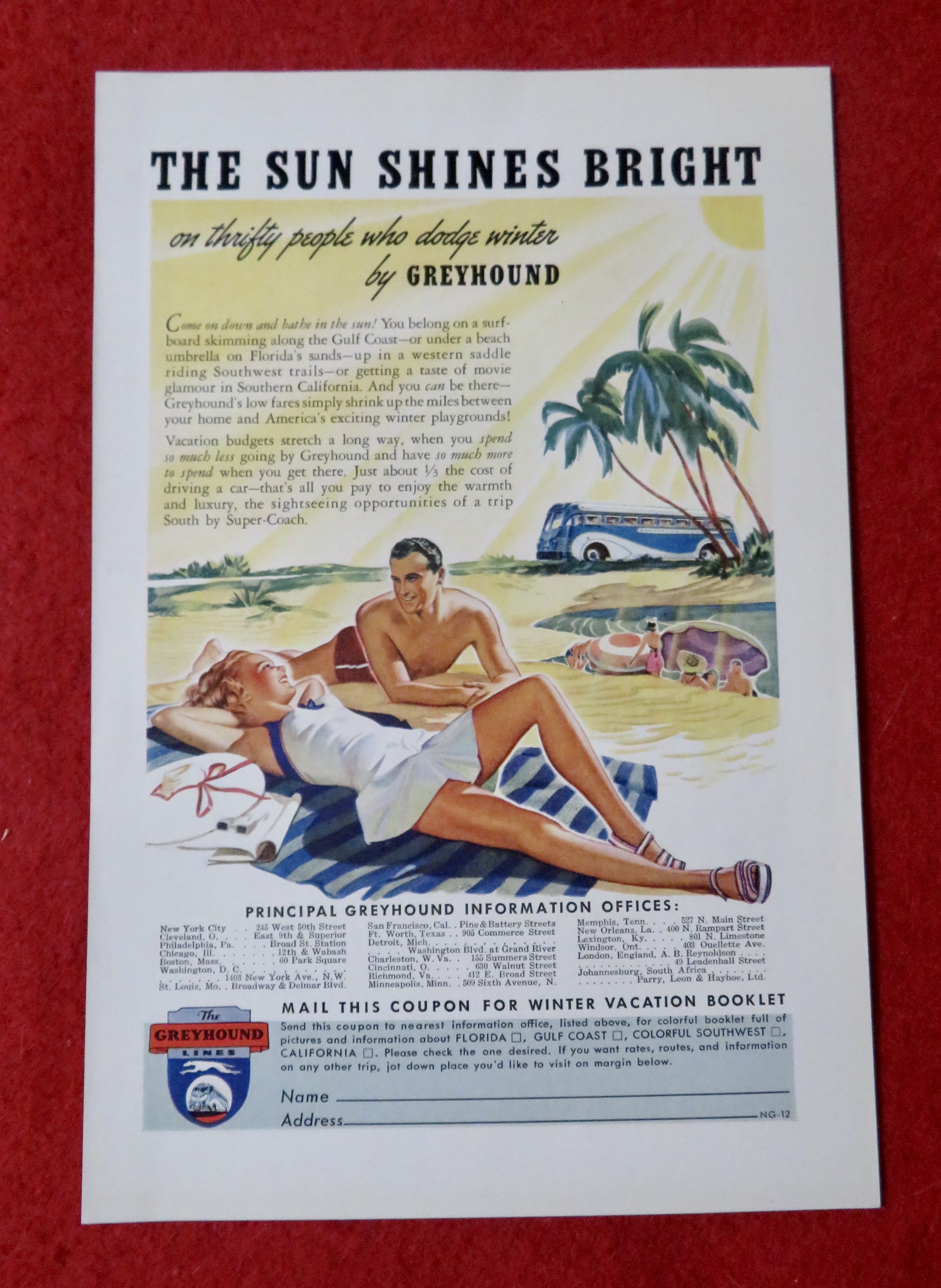 1939 Greyhound Lines with Couple Laying on the Beach