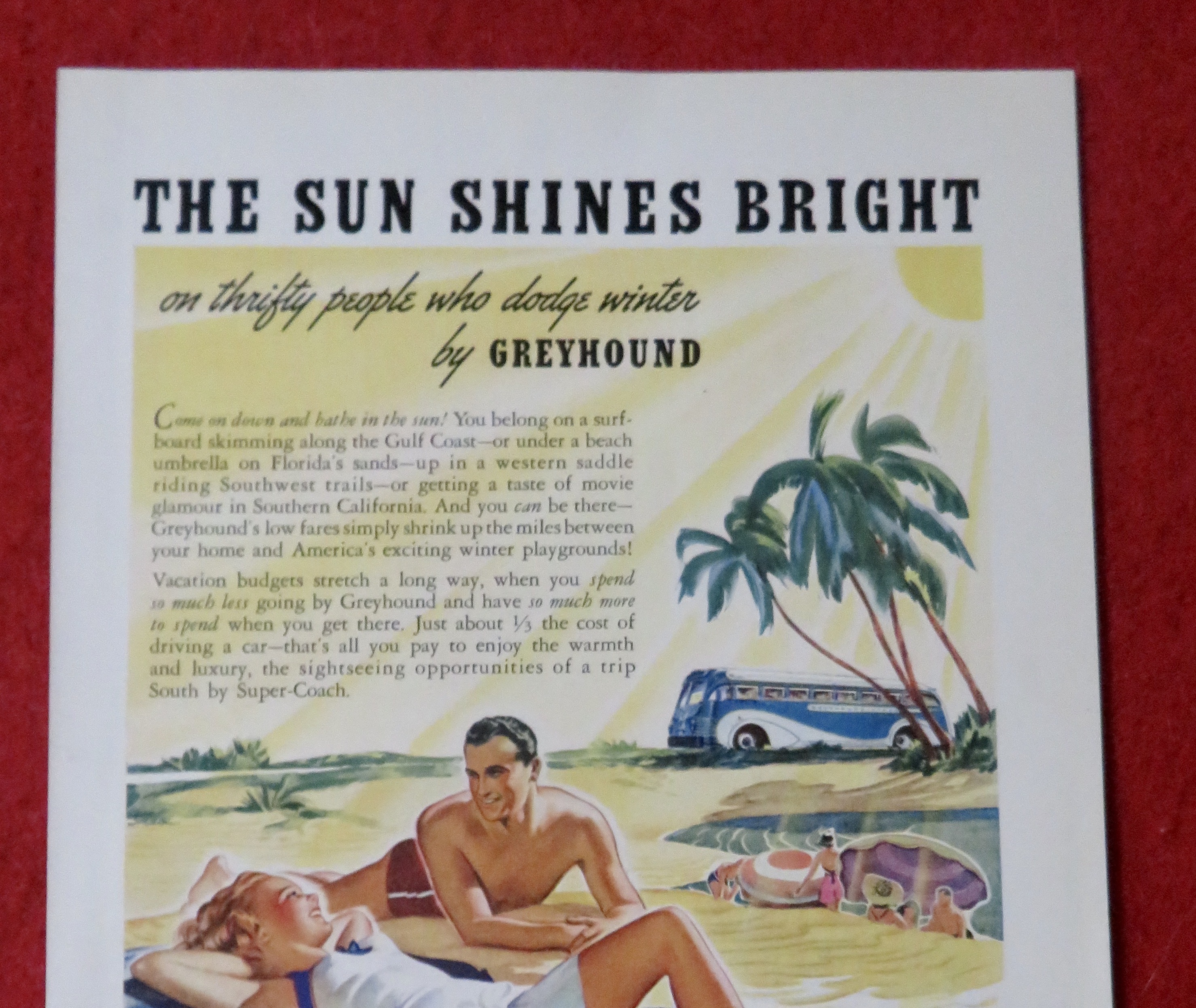 1939 Greyhound Lines with Couple Laying on the Beach
