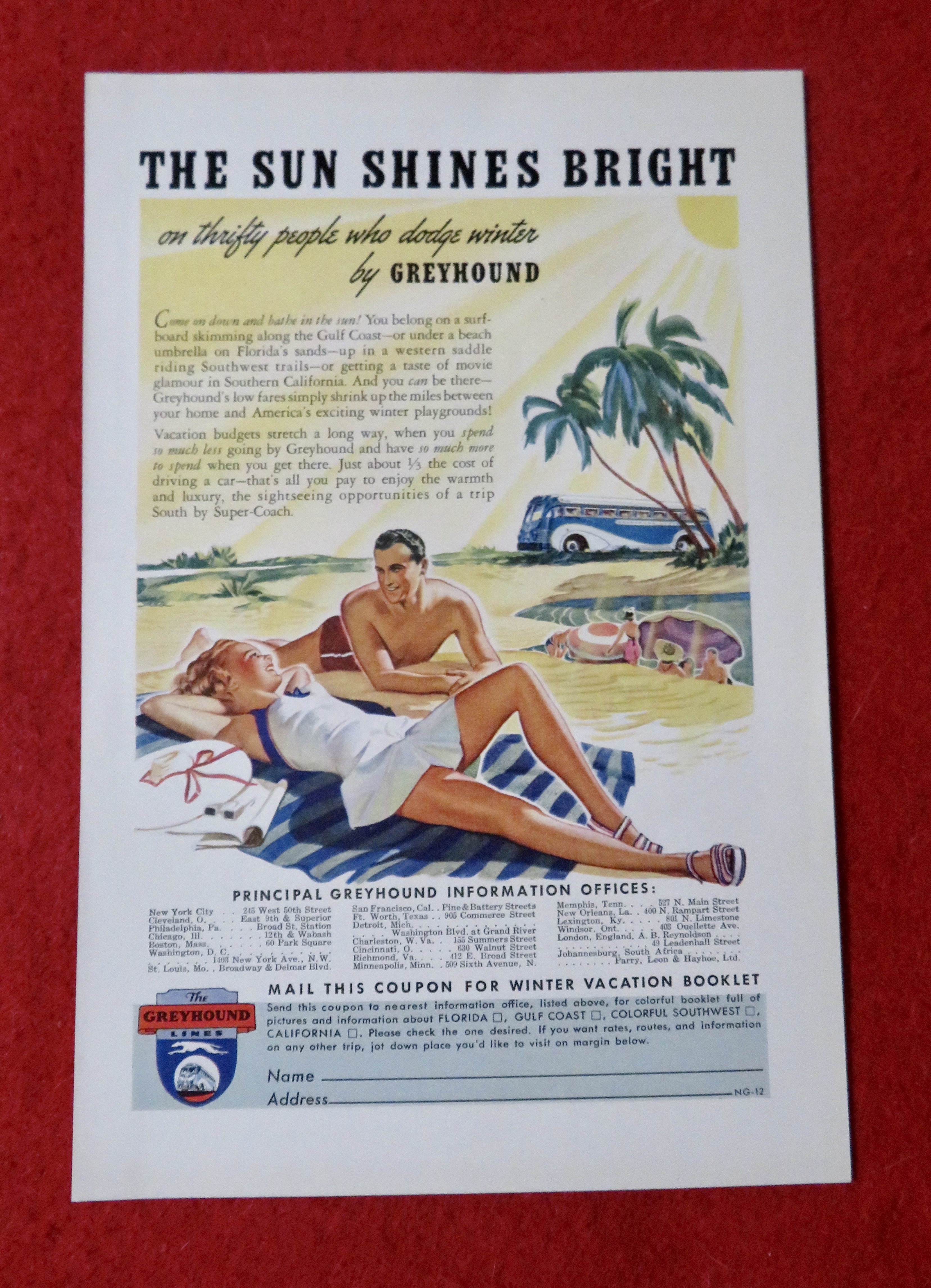 1939 Greyhound Lines with Couple Laying on the Beach