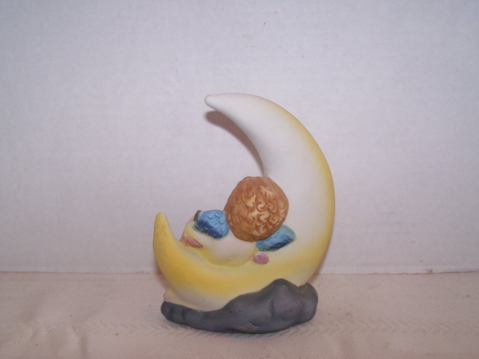 Bisque Boy Angel Sitting in a 1/4 Moon
