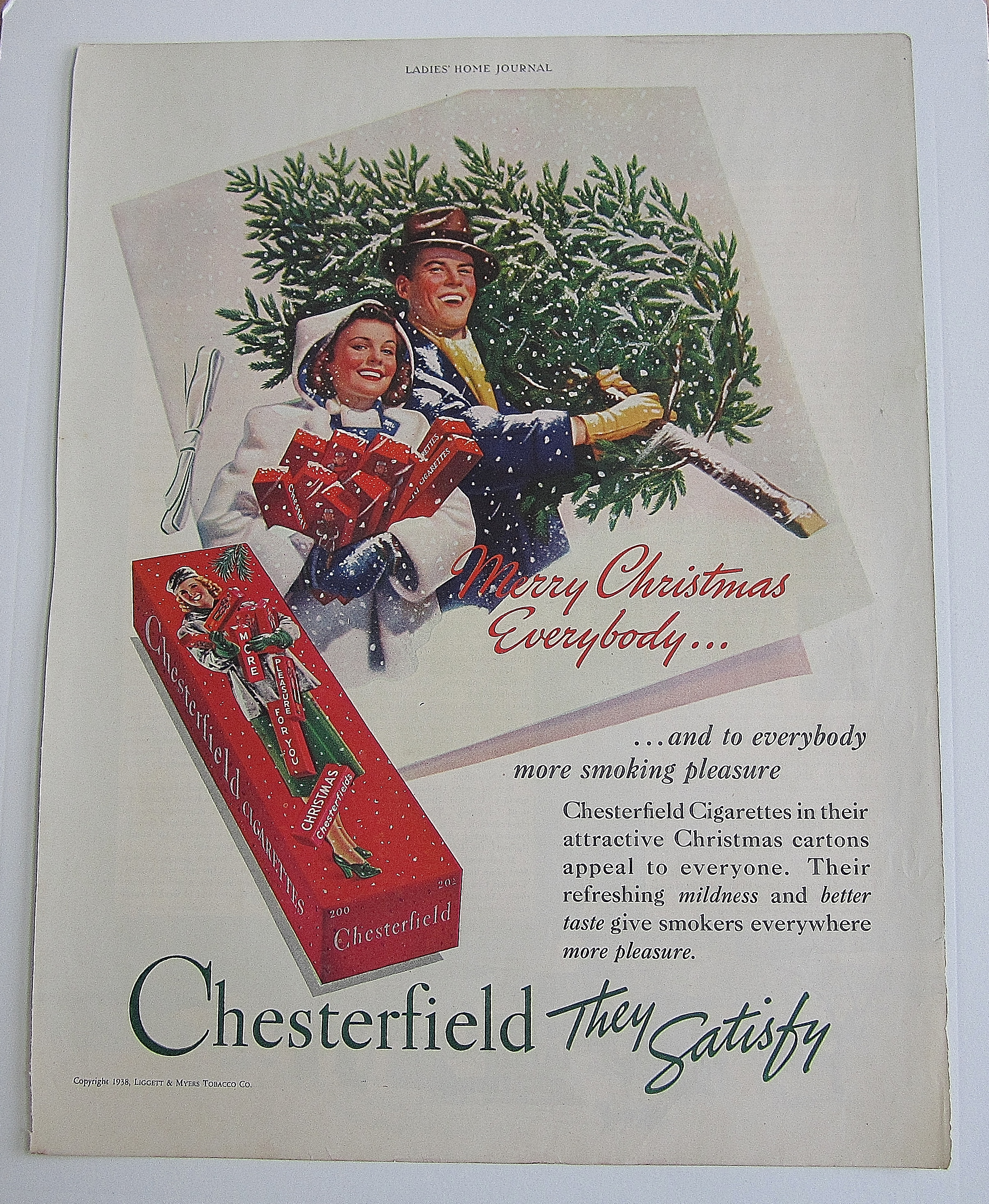 1938 Chesterfield Cigarettes w Man & Woman At Christmas