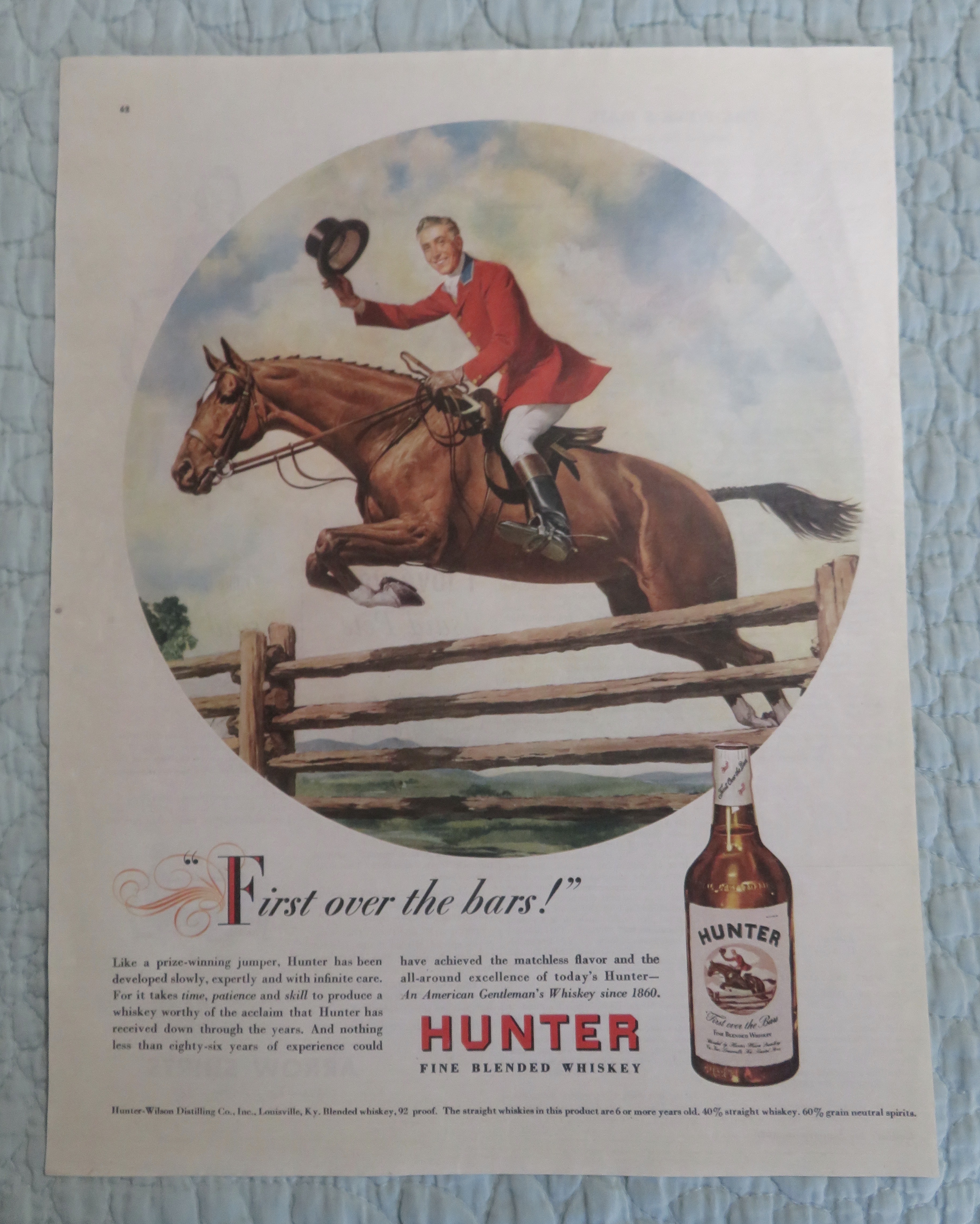 1947 Hunter Whiskey with Man Riding on a Horse