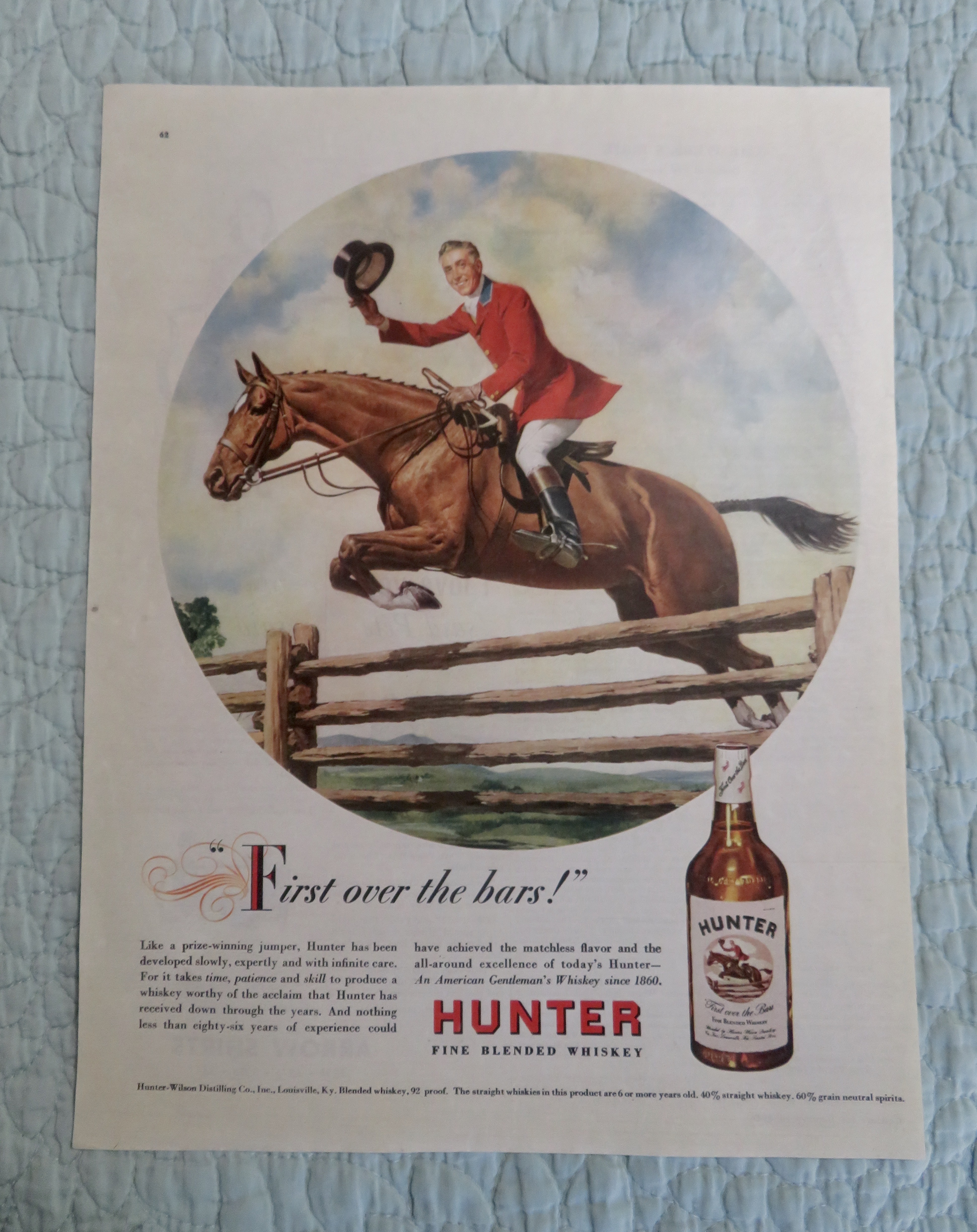 1947 Hunter Whiskey with Man Riding on a Horse