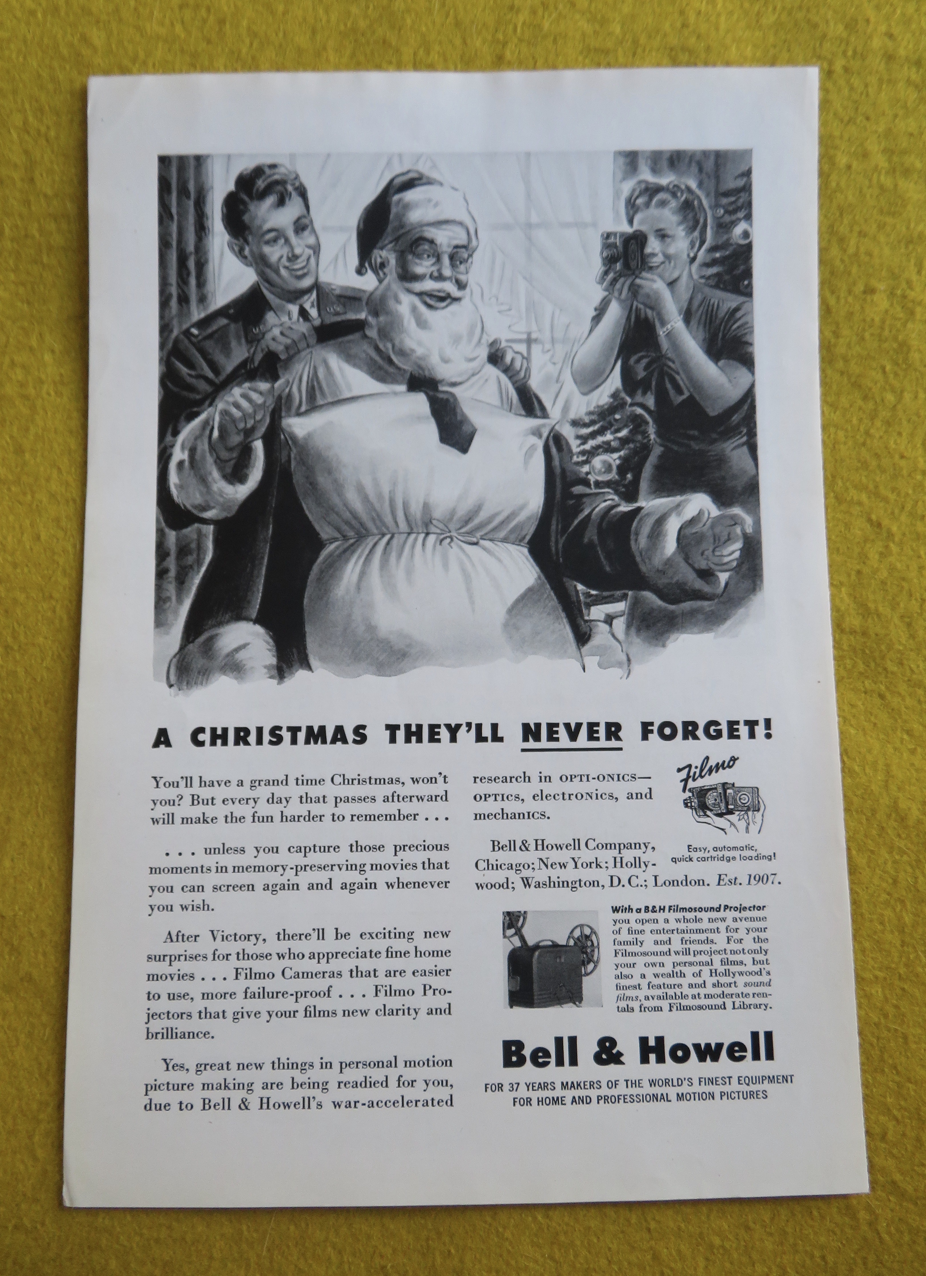 1944 Bell & Howell Filmo Camera with Dad Being Santa