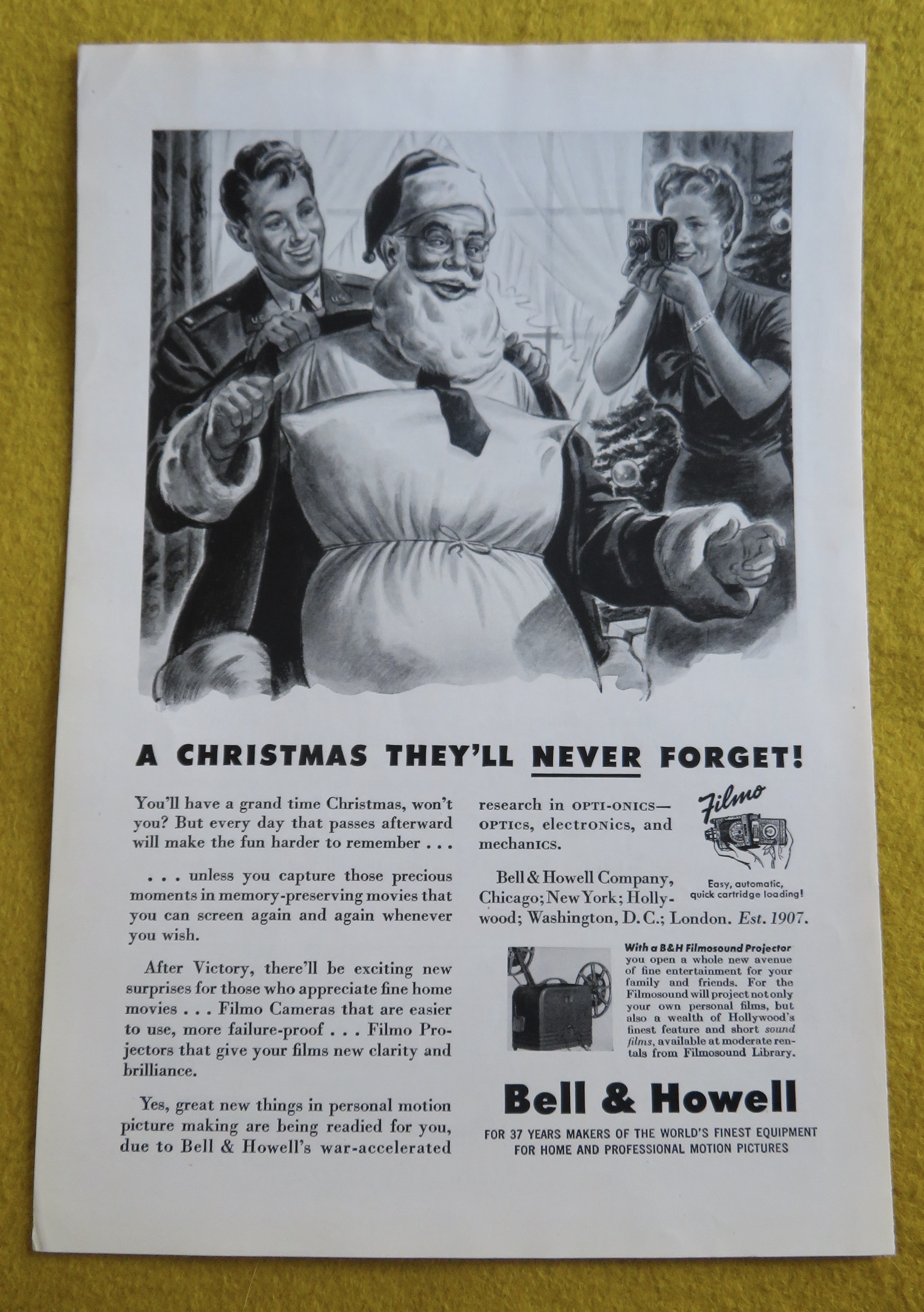 1944 Bell & Howell Filmo Camera with Dad Being Santa