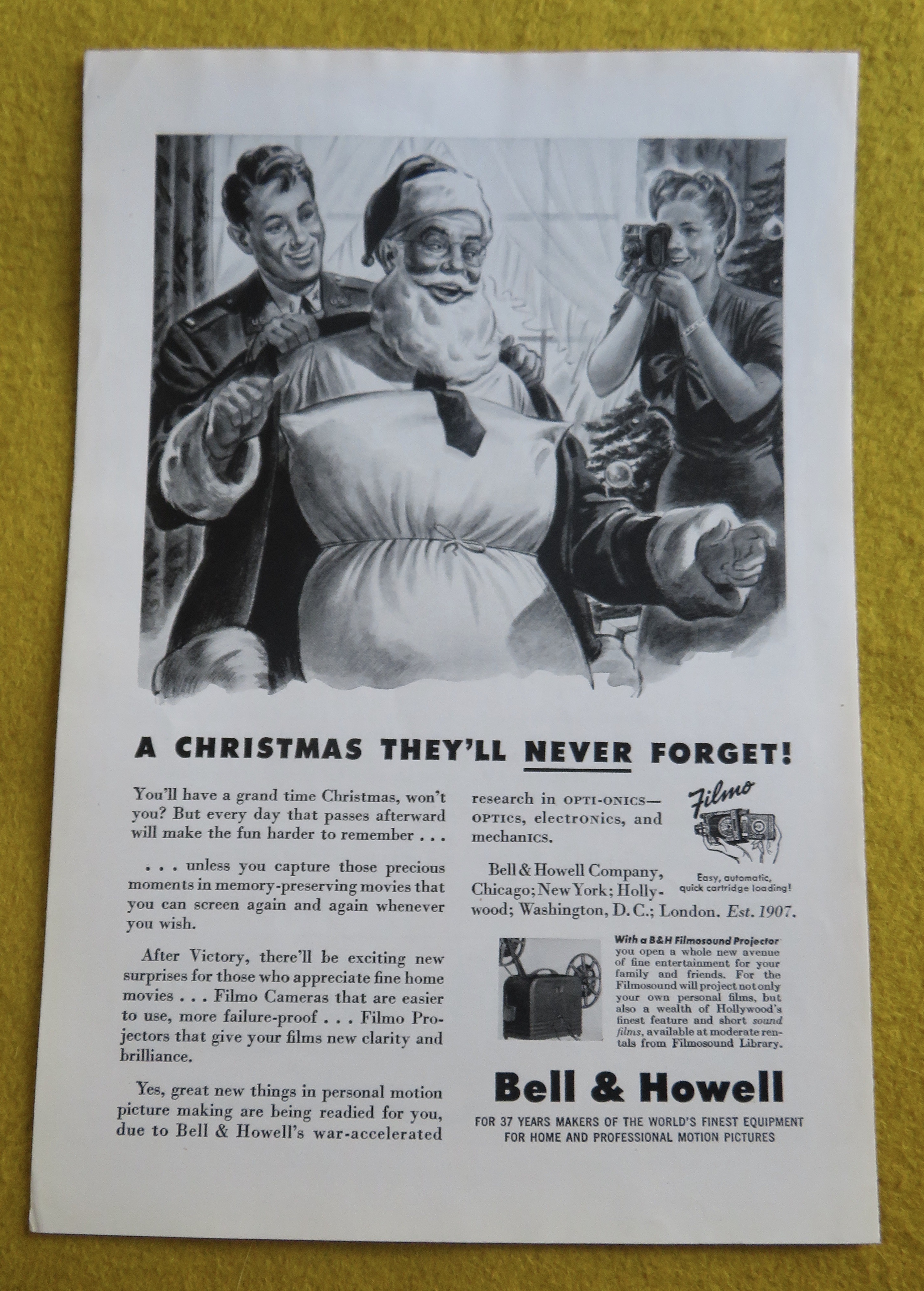 1944 Bell & Howell Filmo Camera with Dad Being Santa