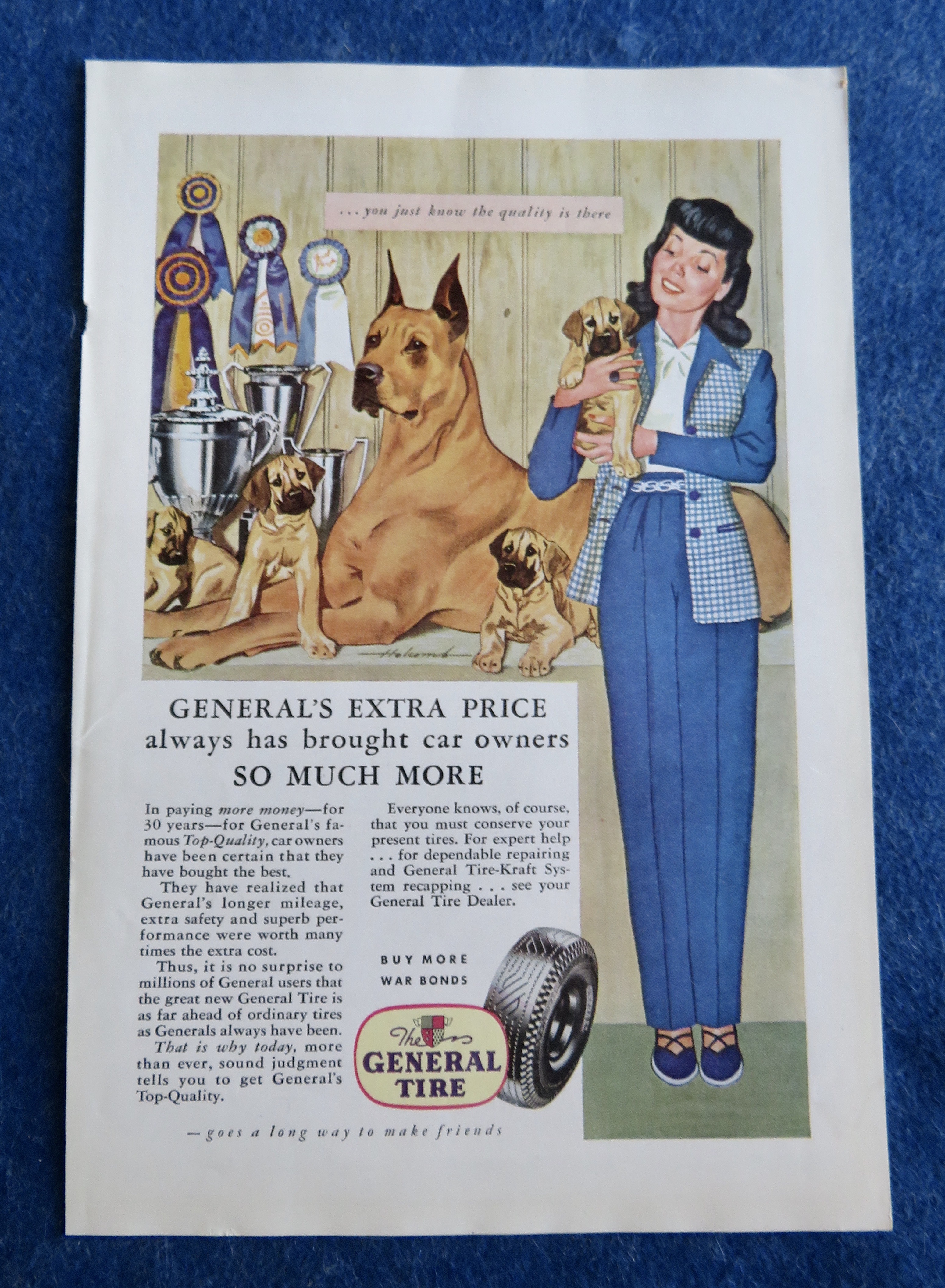 1944 General Tires with Lady Holding a Puppy