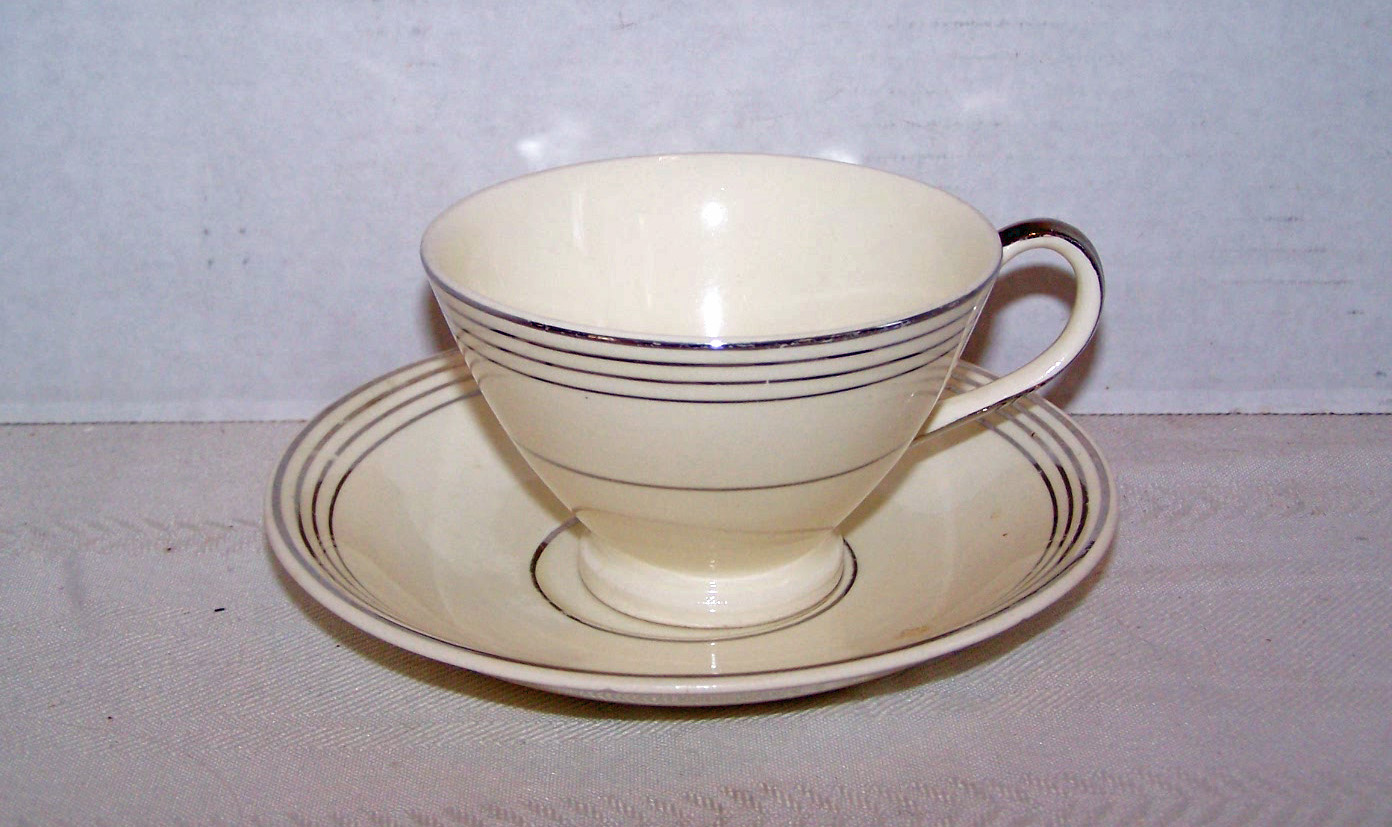 Cup & Saucer, Signed M C China, Made in U.S.A.