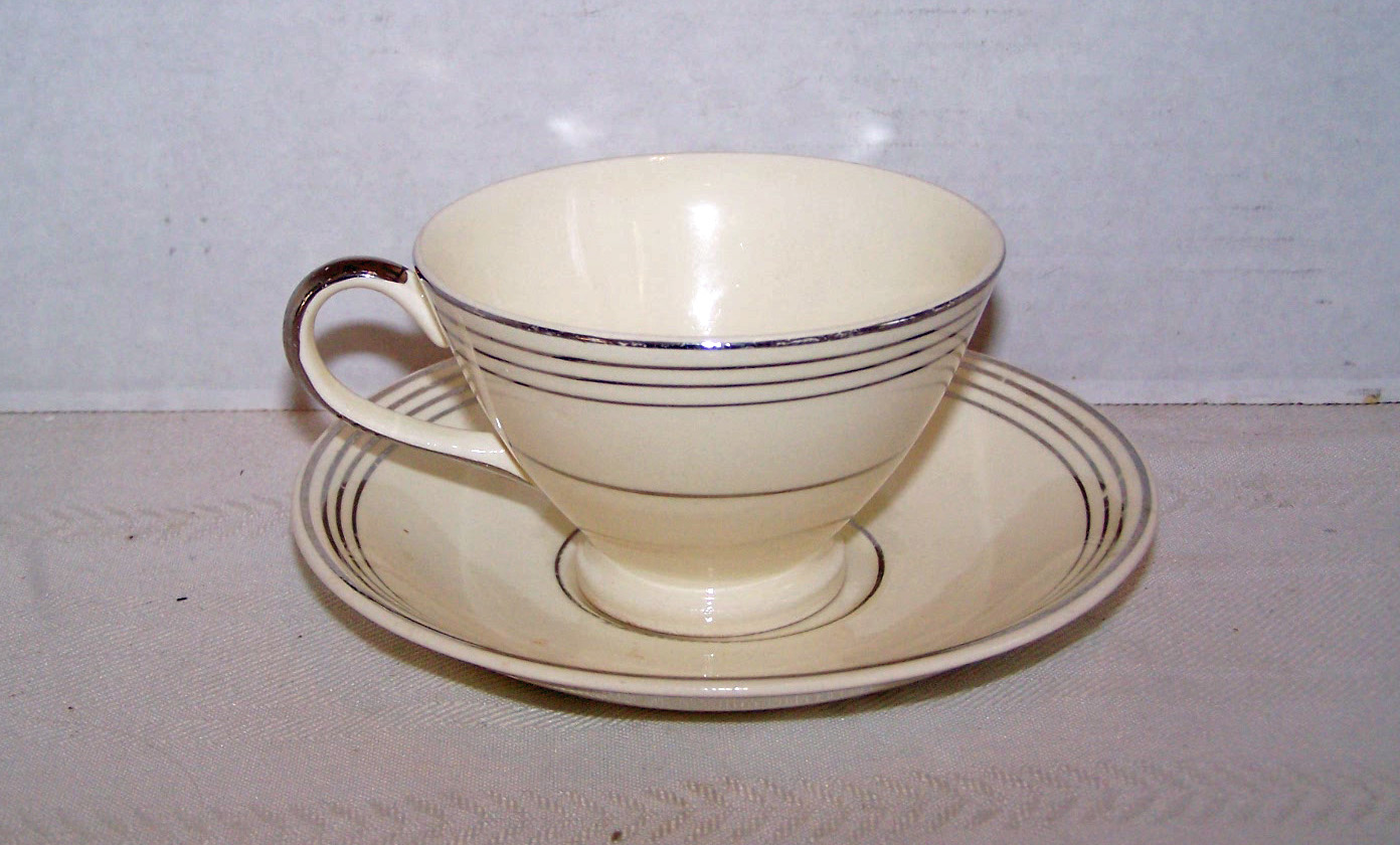 Cup & Saucer, Signed M C China, Made in U.S.A.