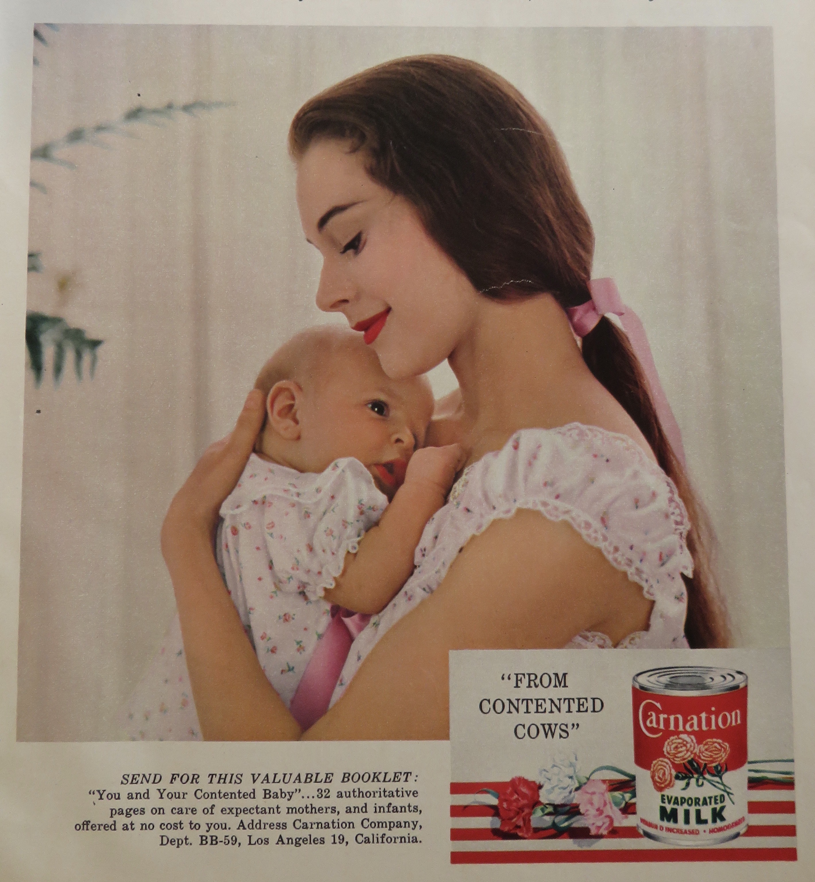 1959 Carnation Milk with Woman Holding Baby