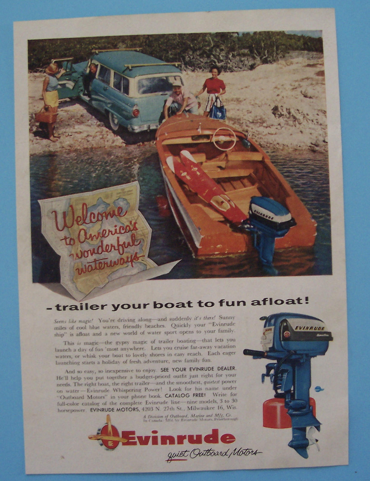 1956 Evinrude Outboard Motors with Man Unhooking Boat