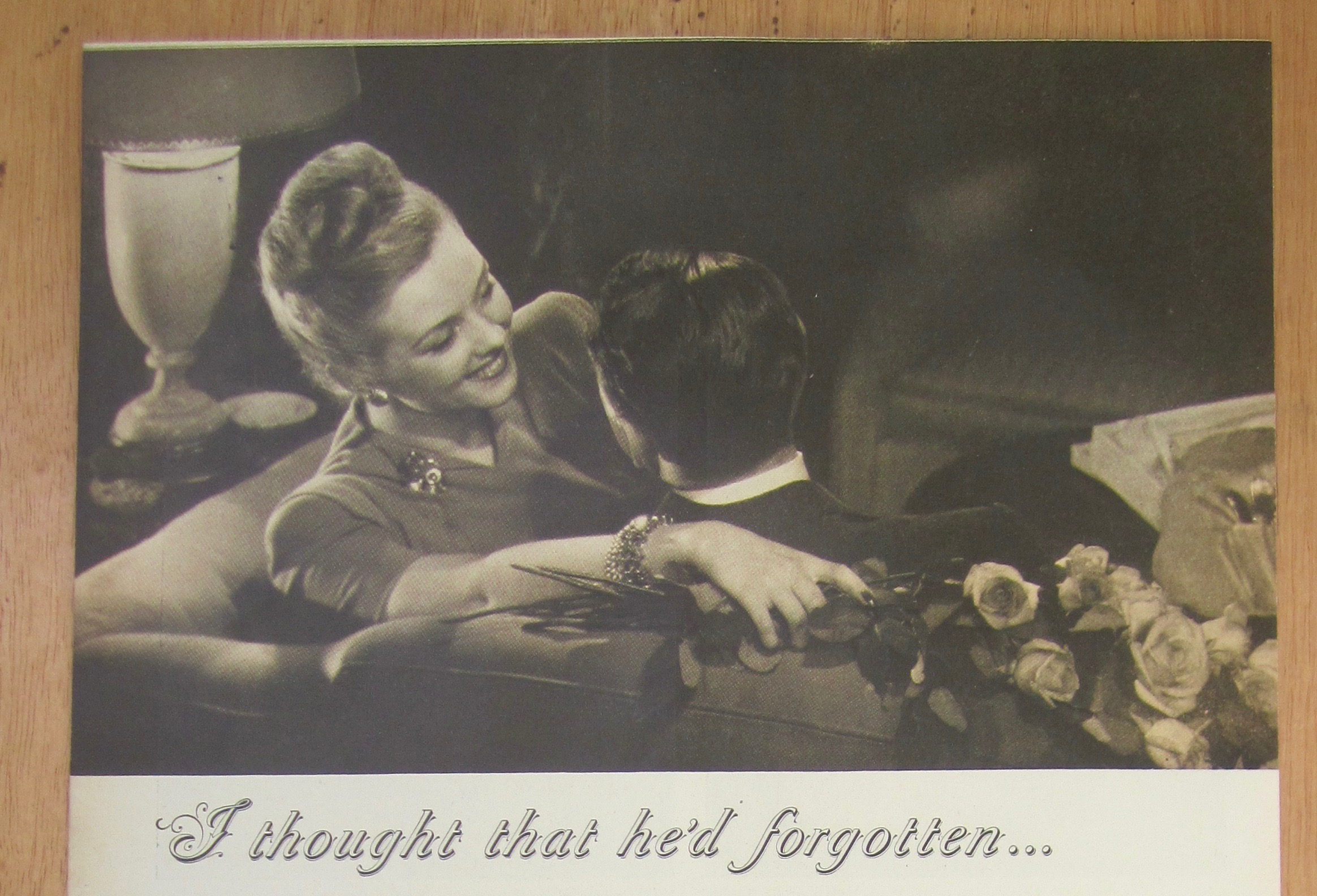 1946 International Sterling with Man & Woman on a Couch