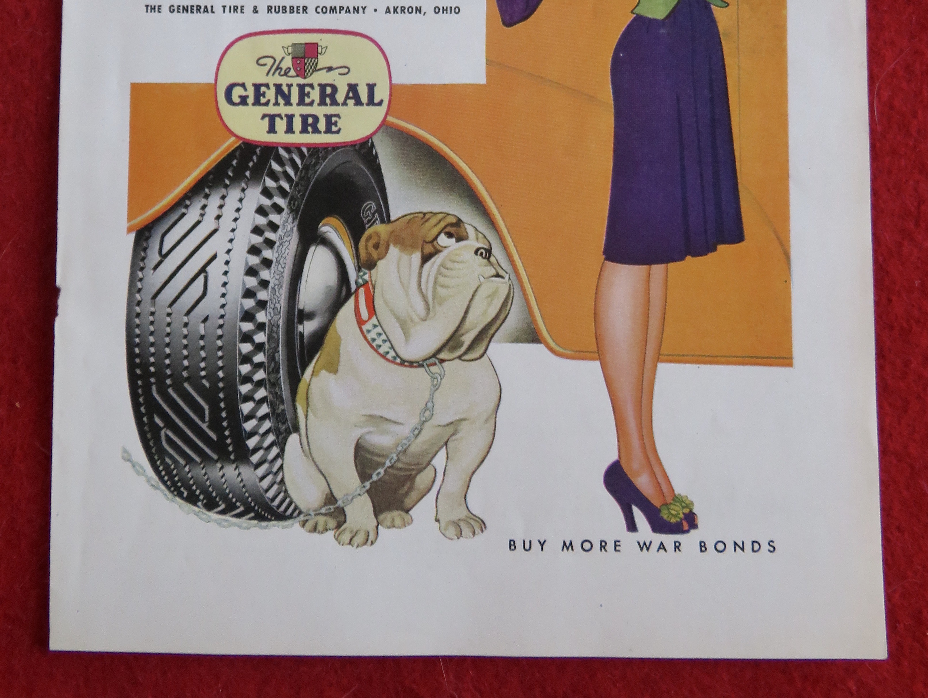 1944 General Tires with Woman Pointing at Her Dog