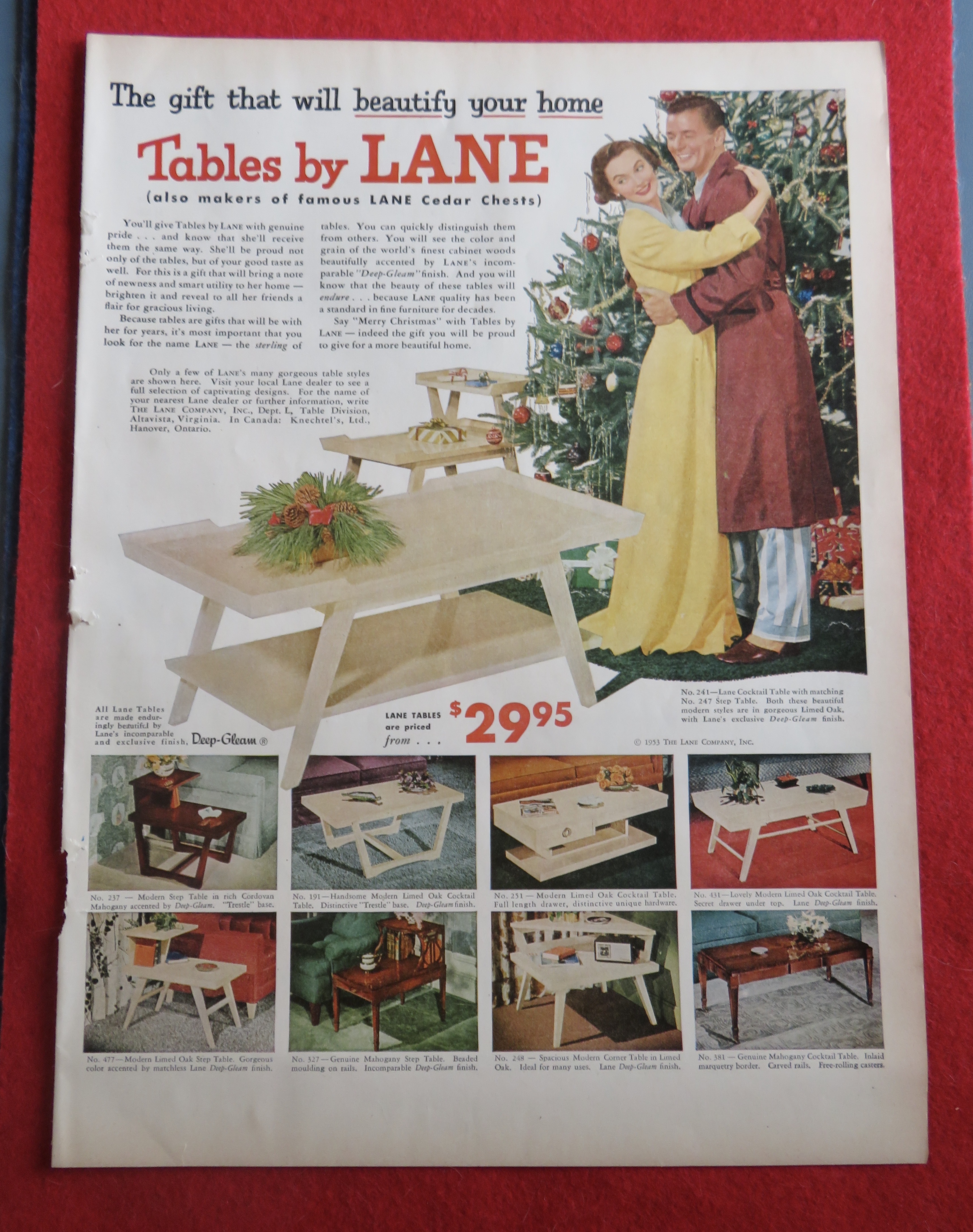 1953 Tables By Lane With Woman Getting Tables For Xmas