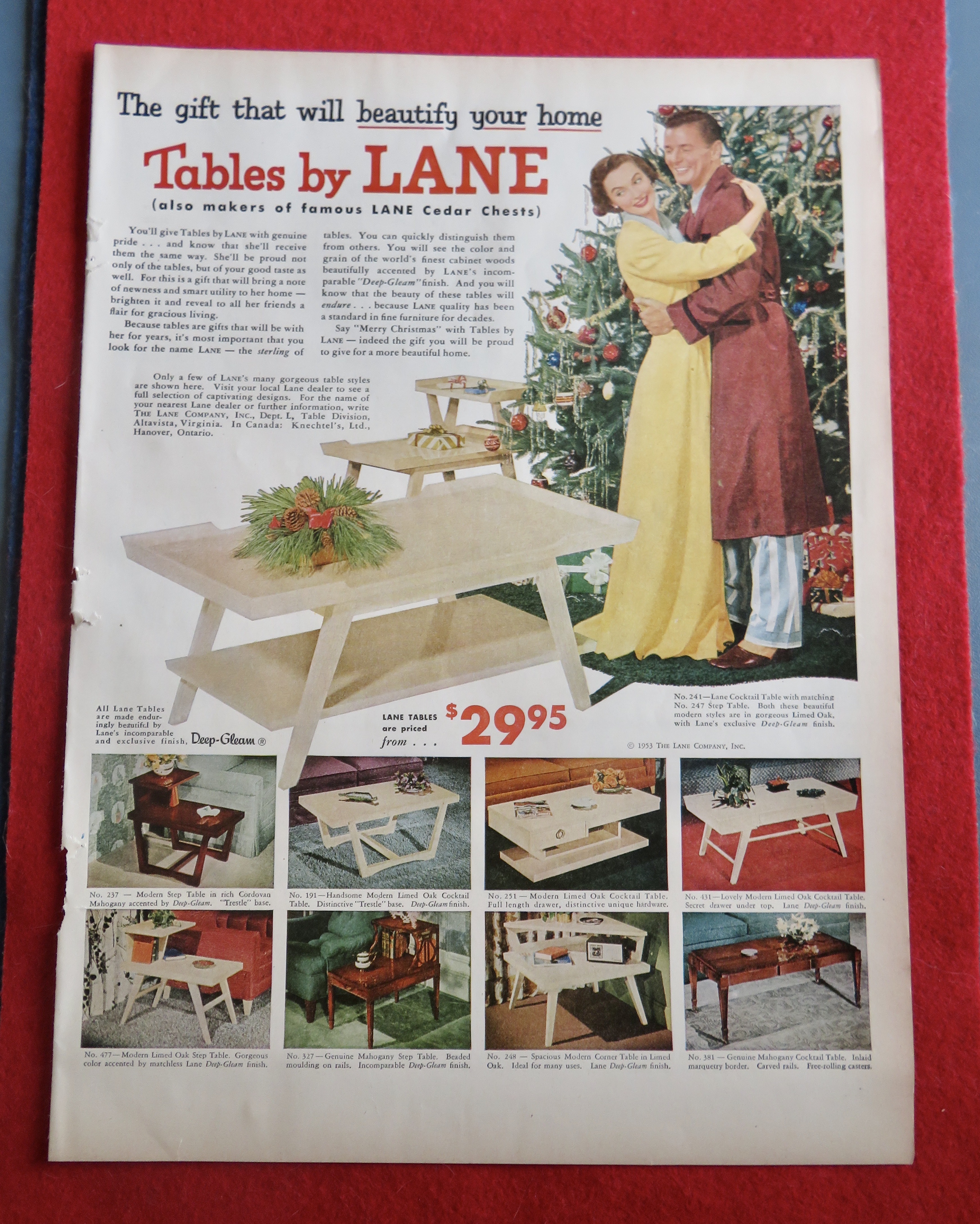 1953 Tables By Lane With Woman Getting Tables For Xmas