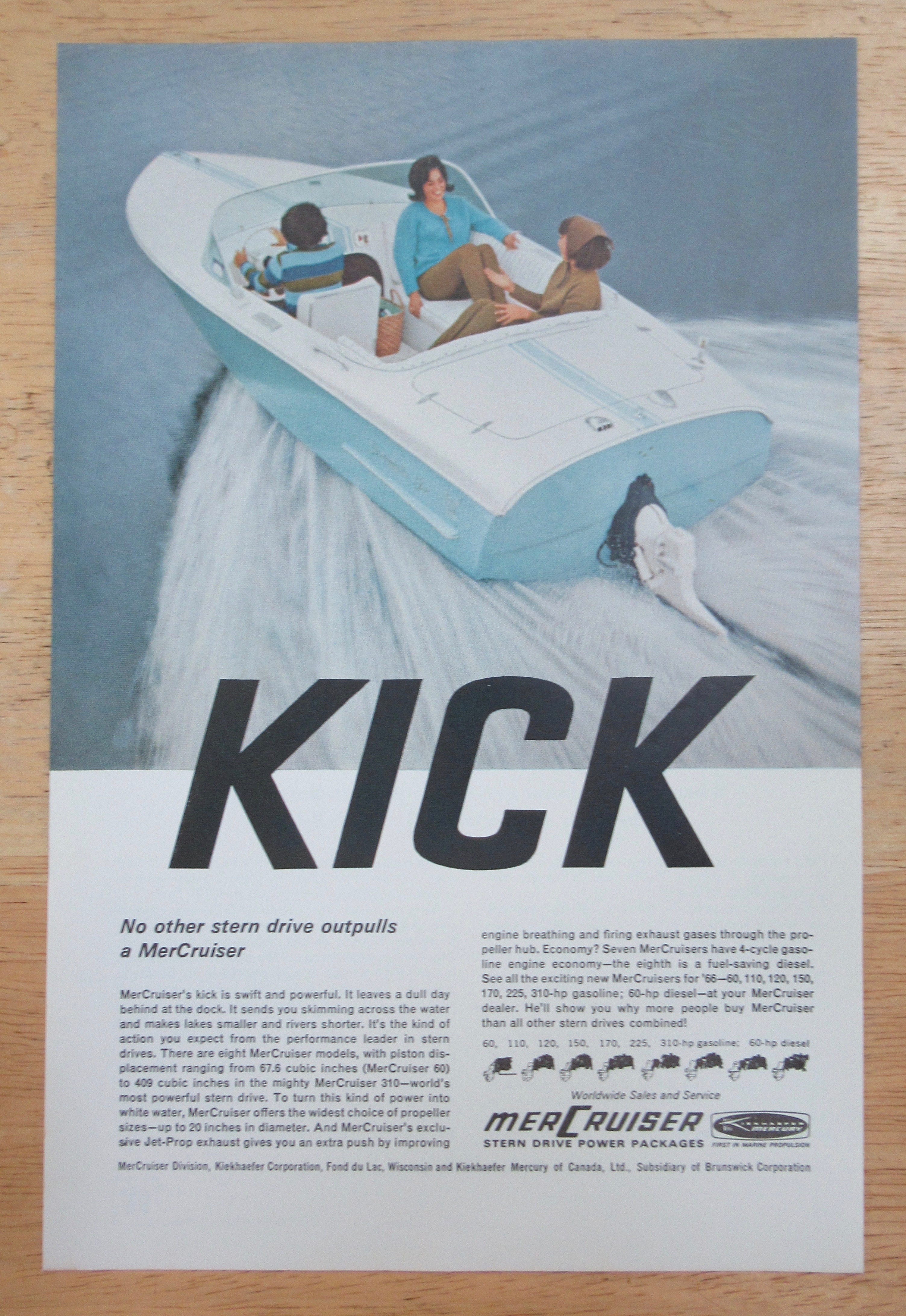 1966 Mercruiser with People Riding On A Speed Boat