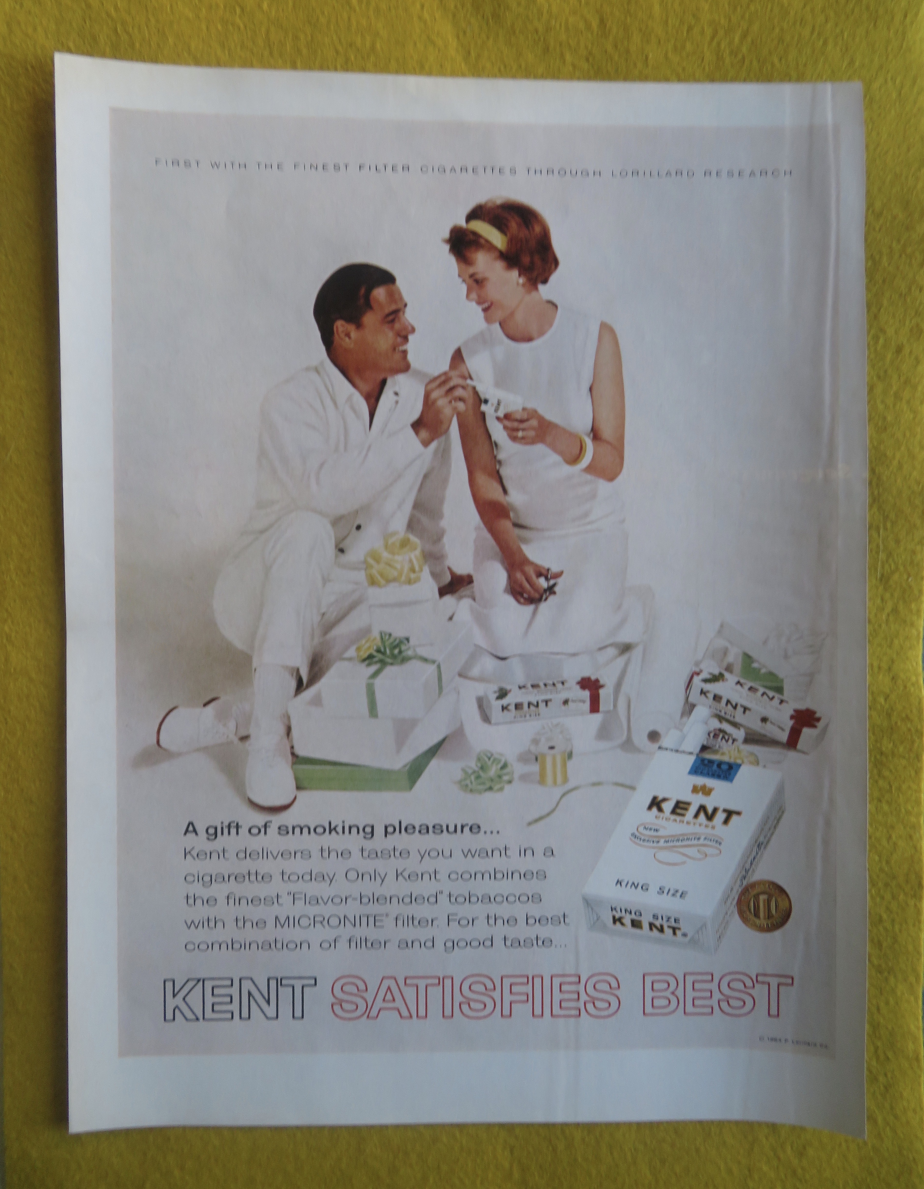 1964 Kent Cigarettes with Man & Woman Wrapping Gifts
