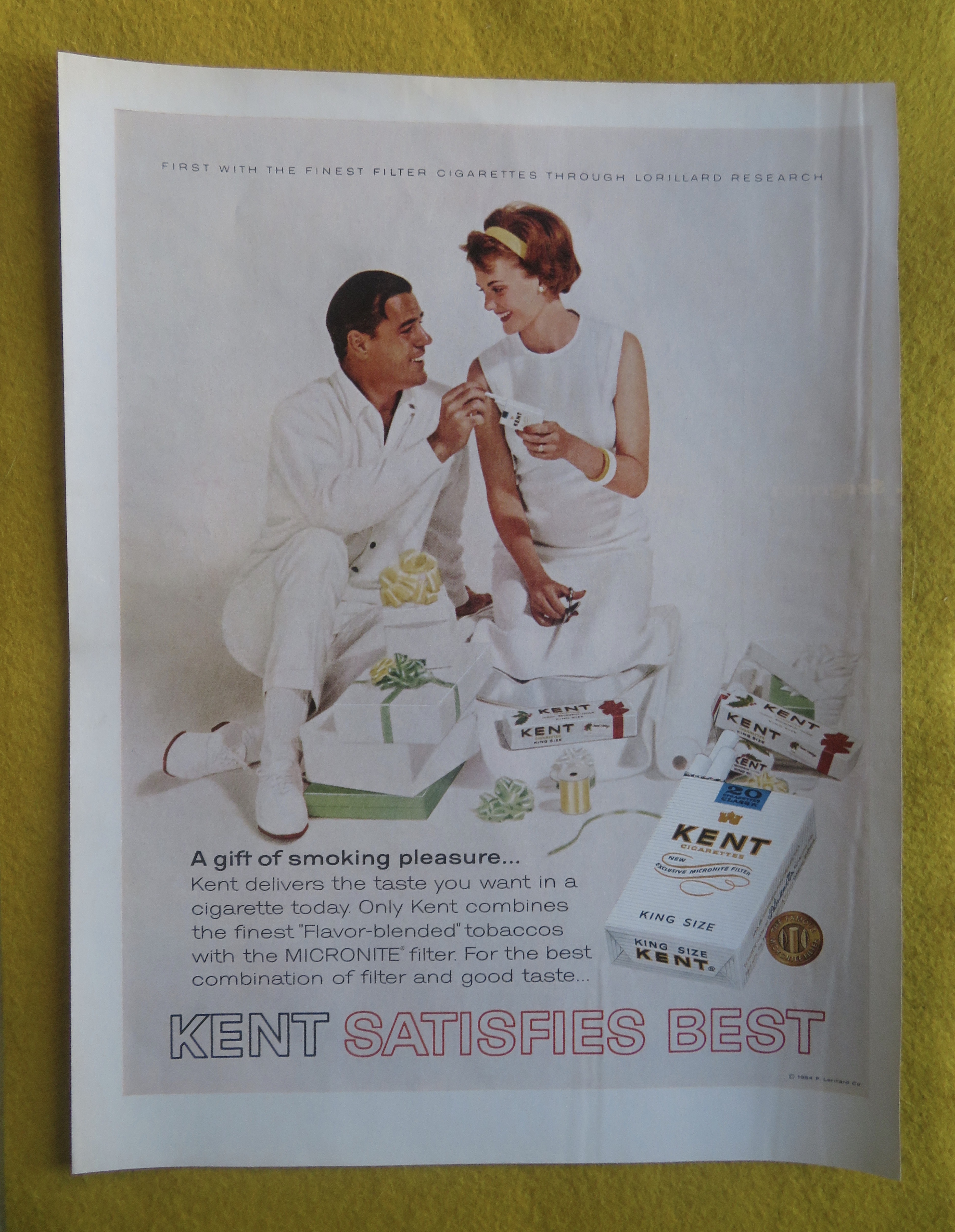 1964 Kent Cigarettes with Man & Woman Wrapping Gifts