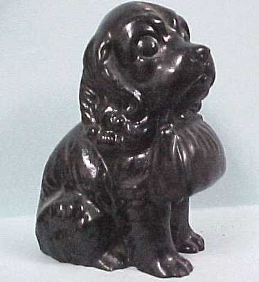 Coal Resin Puppy Holding Purse