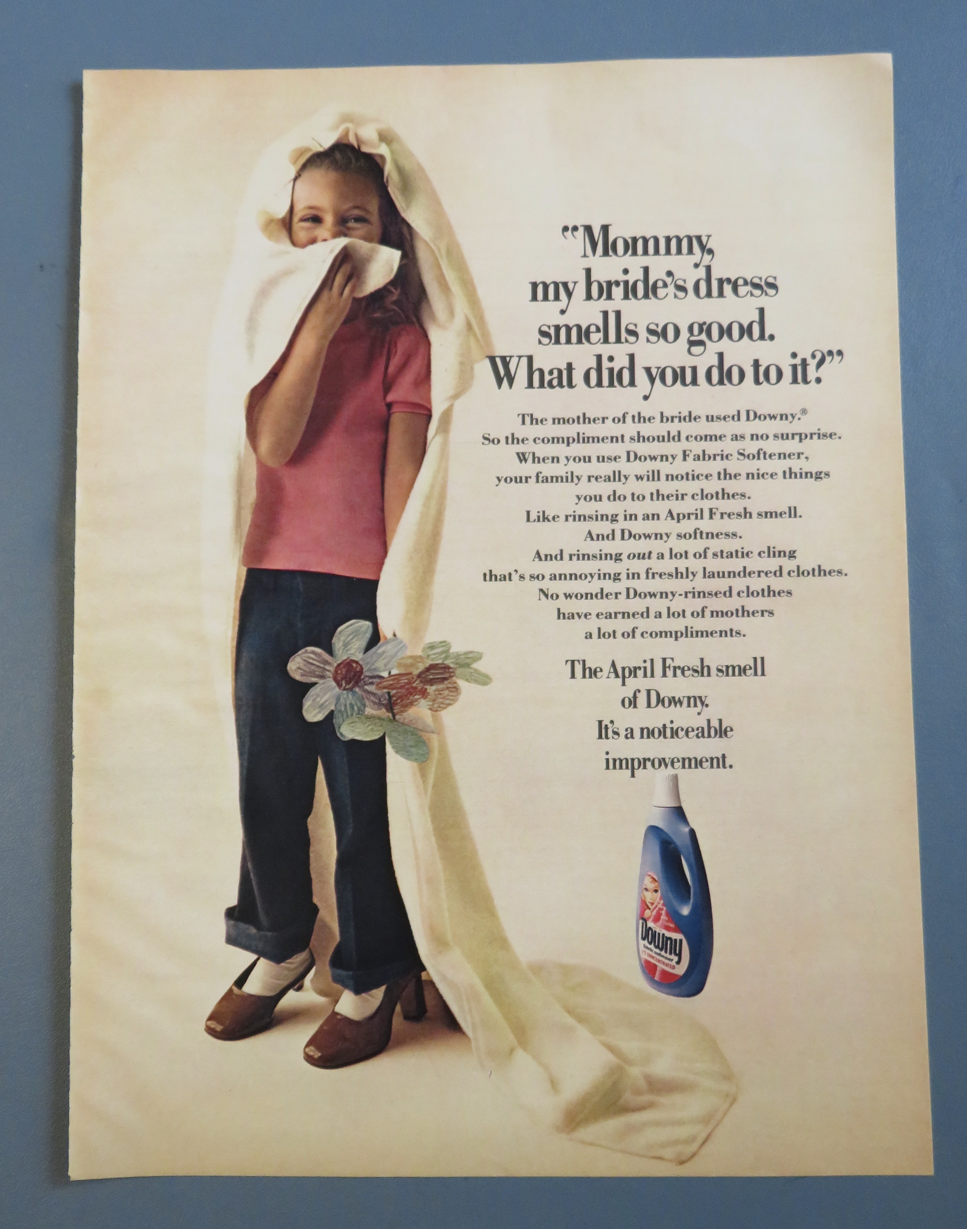 1976 Downy Fabric Softener with Girl Smelling Towel